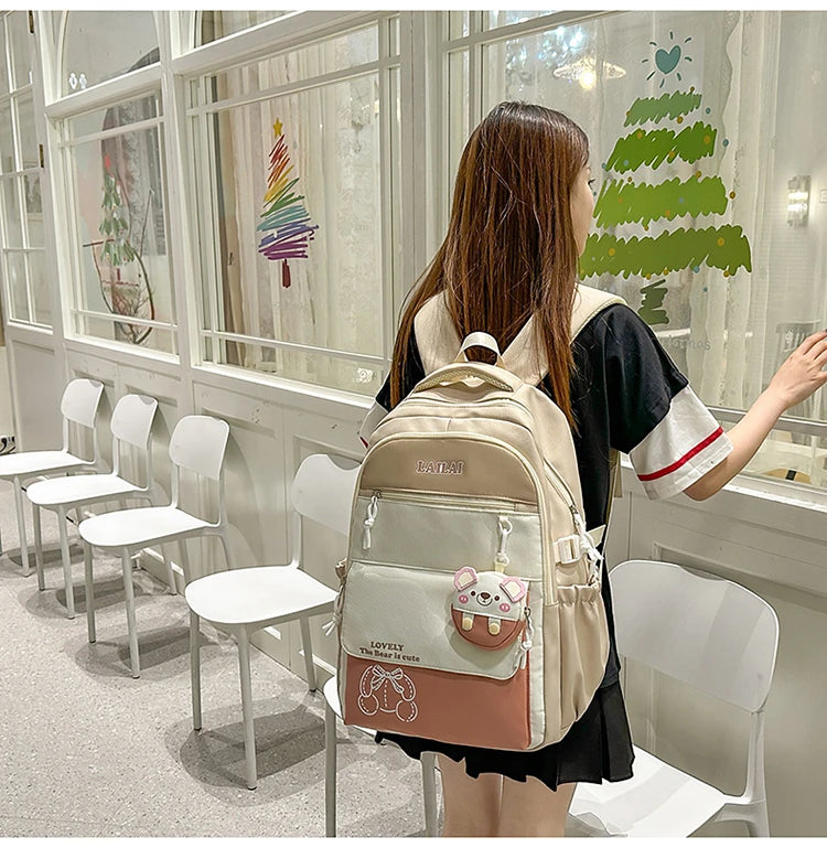 Schoolbag, a lightweight and large - capacity backpack designed for junior high school girls, aiming to relieve pressure and pro
