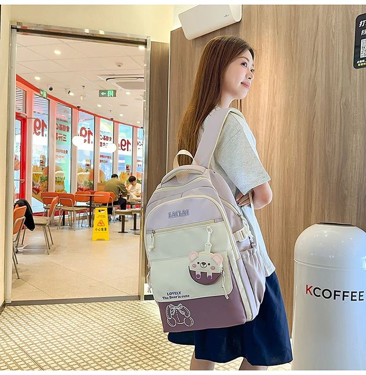 Schoolbag, a lightweight and large - capacity backpack designed for junior high school girls, aiming to relieve pressure and pro
